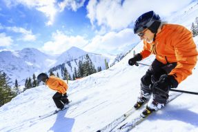 Skiers on mountain
