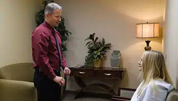 Doctor and patient in waiting room