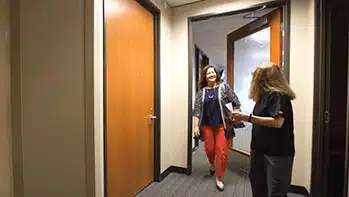 Patient and doctor walking back to exam room