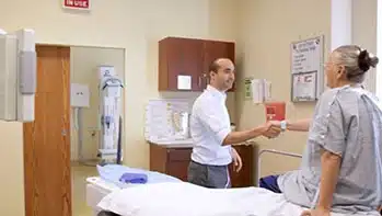 Doctor and patient in exam room