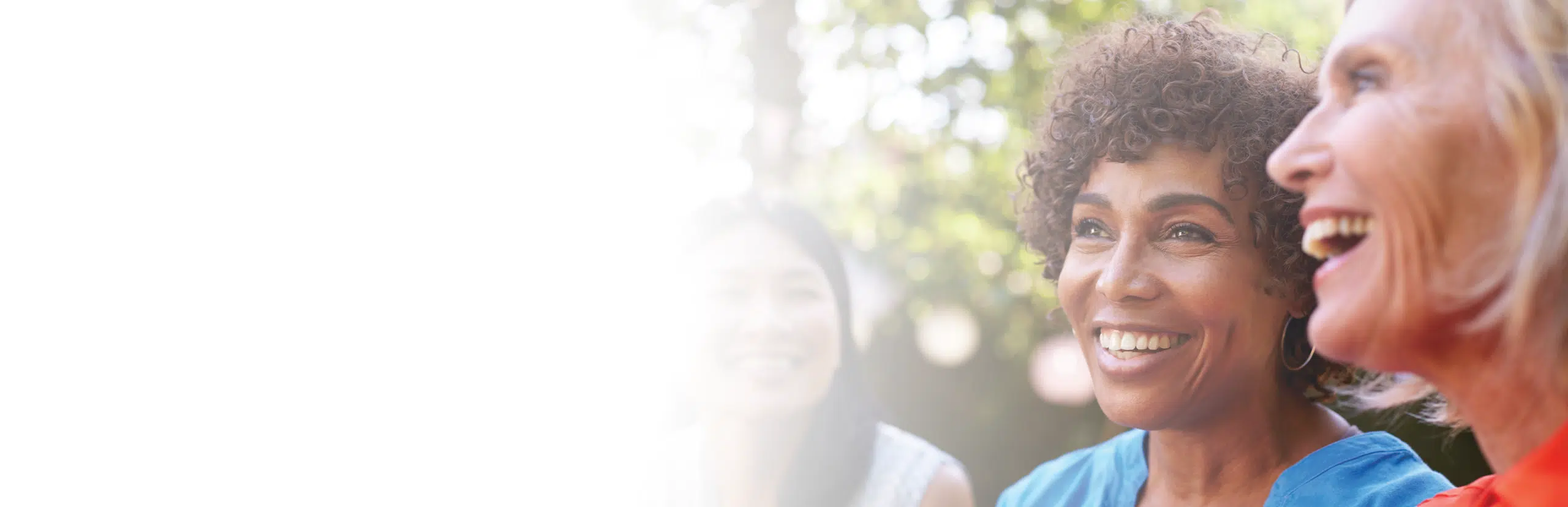 three women smiling
